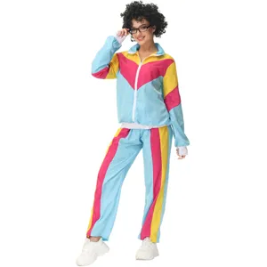 Retro colorful tracksuit detail view, 80s style party costume with pink yellow blue panels.