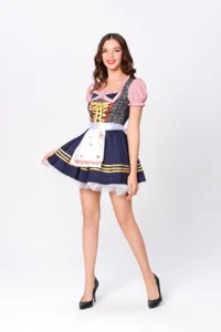 Detailed view of the Bavarian beer festival dress with blue skirt, apron, and traditional lacing.