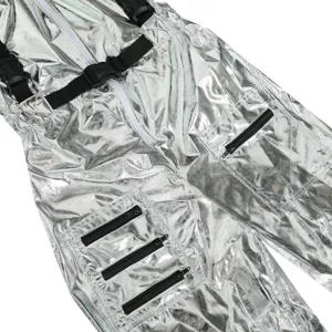 Detailed view of silver sci-fi astronaut costume with metallic fabric and utility pockets.