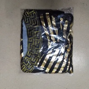 Black and gold Greek key pattern costume dress for Halloween and cosplay events, elegant style.