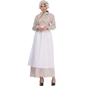 Vista dettagliata del costume coloniale vintage con stampa floreale e grembiule bianco.