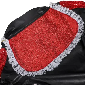 Close-up detail of Halloween sexy queen costume with red sequins and white lace trim.