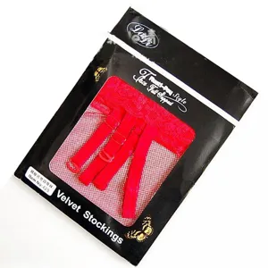 Red sexy fishnet stockings with garter belt set, European and American adult lace hosiery detail.
