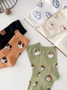 Cute animal pattern combed cotton mid-tube socks for women, cozy and stylish daily wear detail.