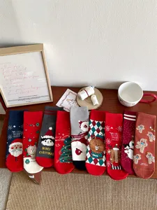 Christmas women mid-tube cotton socks set featuring cute Santa, elk and cartoon bear patterns.