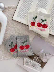 Cute cherry pattern mid-calf cotton socks for women, cozy and stylish casual hosiery.