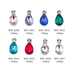 Close-up detail of colorful teardrop nail art rhinestones with alloy base, 4x8mm.