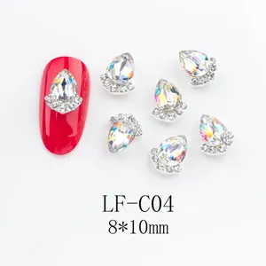 Detailed view of Japanese alloy teardrop AB crystal nail art rhinestones, 8x10mm size.