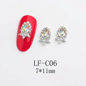 Close-up product detail view of AB crystal nail charms alloy teardrop rhinestone manicure.