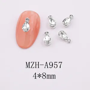 Teardrop crystal nail art charms, 4x8mm double rhinestone alloy gems for DIY manicure design.
