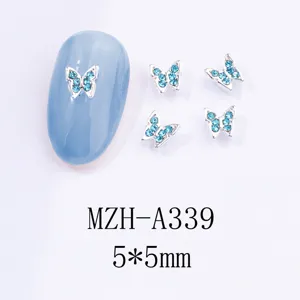 Dettaglio di strass per unghie a farfalla in stile giapponese colore blu lago, 5x5mm.