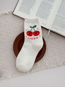 Cute cherry embroidered white cotton mid-tube socks detail shot showcasing cozy casual daily wear style.