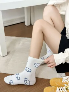 Detailed view of women's cute cartoon animal flocked mid-calf socks in soft combed cotton.