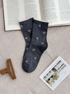 Dark grey combed cotton mid-calf socks with cute pink floral embroidery and sweet bubble cuff.