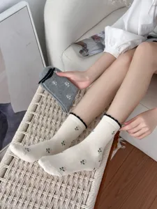 Women cotton mid-tube socks with cute floral print and lettuce edge. Soft and comfy.