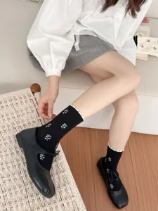 Women black mid tube socks sweet floral pattern pearl bubble cuff casual daily footwear detail