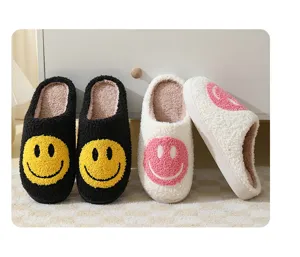 Cute smiley plush slippers detail view, soft warm house shoes with thick anti-slip sole.
