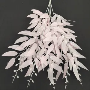 Detailed view of artificial pink willow leaf vine branch, perfect for wedding and event decor.
