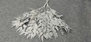 Artificial eucalyptus leaves branch bundle for wedding decoration and home floral arrangement detail.