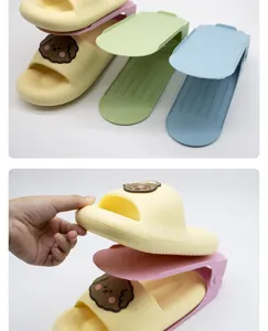 Adjustable plastic shoe rack detail showing multi-tier space-saving organizer design.
