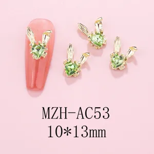 Gold bunny ear nail charms with green crystal rhinestones for DIY nail art design details 10x13mm
