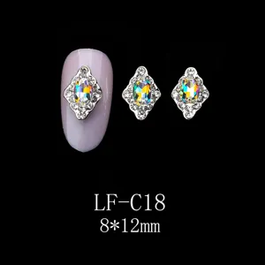 Detailed view of rhombic alloy nail art rhinestones with iridescent crystals, size 8x12mm.