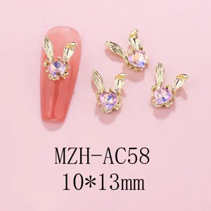 Gold rabbit nail charms with pink crystal heart. 10x13mm size alloy DIY manicure accessories.