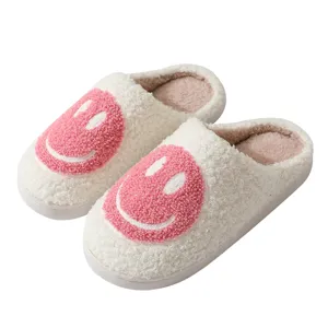 Cute fleece smiley face winter cotton slippers for women and men warm indoor home shoes.