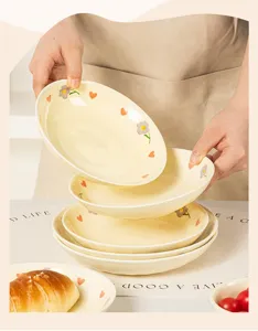 Cream ceramic dinner plate set with cute floral and heart patterns for home dining and kitchen use.