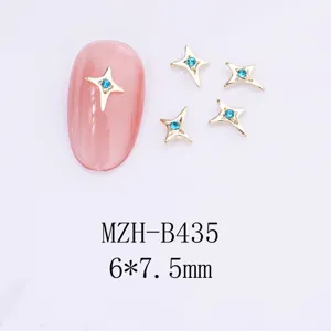 Vue détaillée de charms d'ongles étoile 3D avec strass bleus, décoration nail art en métal.