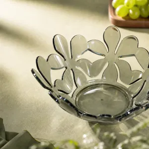 Close-up of clear petal fruit bowl, glossy polished finish and seamless design details.
