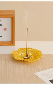 Metal leaf incense burner with snail figurine, creative sandalwood holder for home desktop decor.