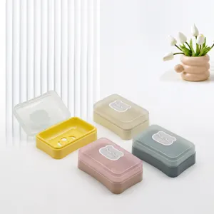 Portasapone minimalista con coperchio trasparente e scolo, organizer bagno colorato.