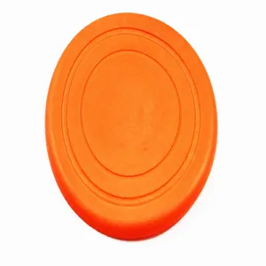 Disco volante per animali domestici arancione dettaglio superficie in gomma resistente.