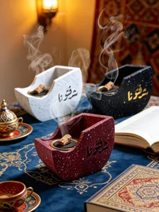 Creative resin boat incense burner with Arabic calligraphy, ideal for home decor items.