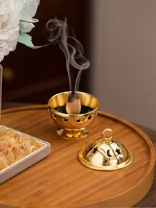Golden metal incense burner with hollow star moon design, elegant desktop decor for home aromathera
