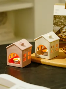 Ceramic house tealight candle holder for holiday home table decor, cozy modern ceramic lantern.