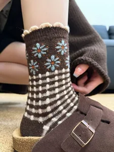 Retro wool blend socks detail, brown knit with floral pattern and cute lace cuff design.