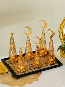 Gold metal candle holders set, hallowed cone design with star and moon motifs for decor.