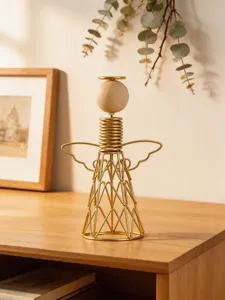 Detailed view of the iron wood angel tabletop ornament, showcasing delicate metal wire art.