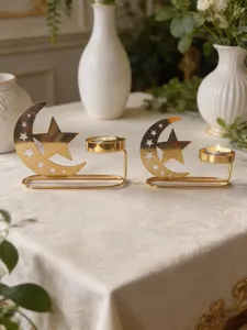Gold metal moon star tea light candle holder set for home decor and festive table centerpieces.