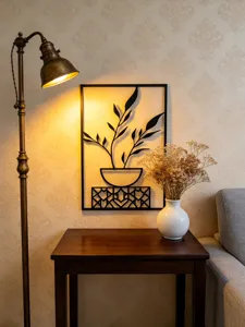 Detailed view of modern black iron leaf wall art metal hanging decoration for home decor.