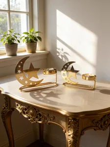 Gold star and moon candle holder set, elegant metal tealight stand for home decor.