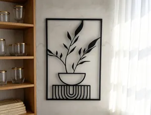 Modern black metal wall art decor botanical plant sculpture for home living room office interior.