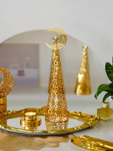 Gold metal hollow Christmas tree candle holder, European style holiday wedding decor piece.