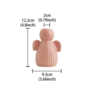 Pink ceramic angel vase, cute table decor flower arrangement vessel, aesthetic home ornament.
