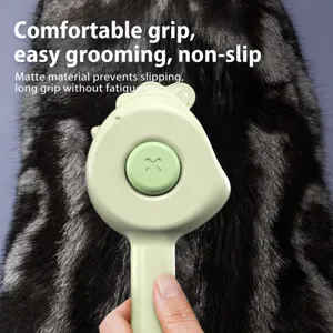 Pet self cleaning hair brush for dogs and cats green ergonomic handle grooming tool main view