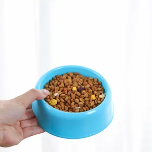 Plastic pet bowl with ergonomic grip design for cats and dogs, durable and easy to hold.