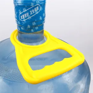Ergonomic yellow bottled water handle lifter for easy carrying. Heavy-duty plastic bucket carrier tool.