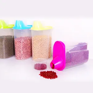 Transparent plastic grain storage container set with colored lids for kitchen organization.